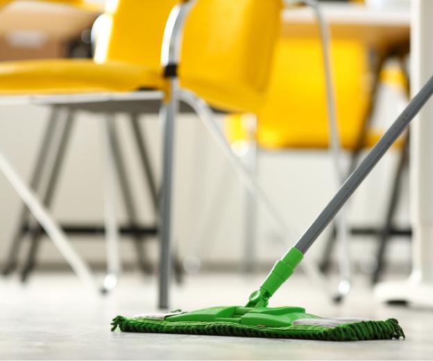 Auxilio custodial staff maintaining a school facility